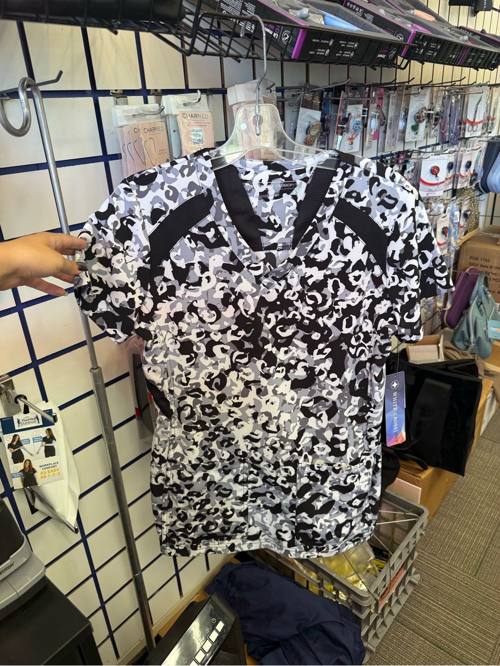 Women's camo black and white scrub top.